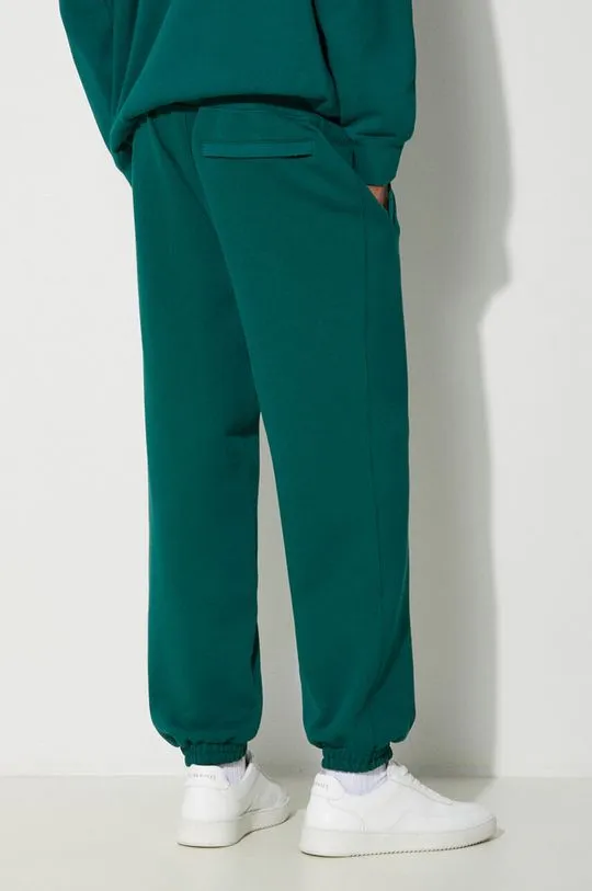 Puma cotton joggers MMQ Sweatpants green color 624007